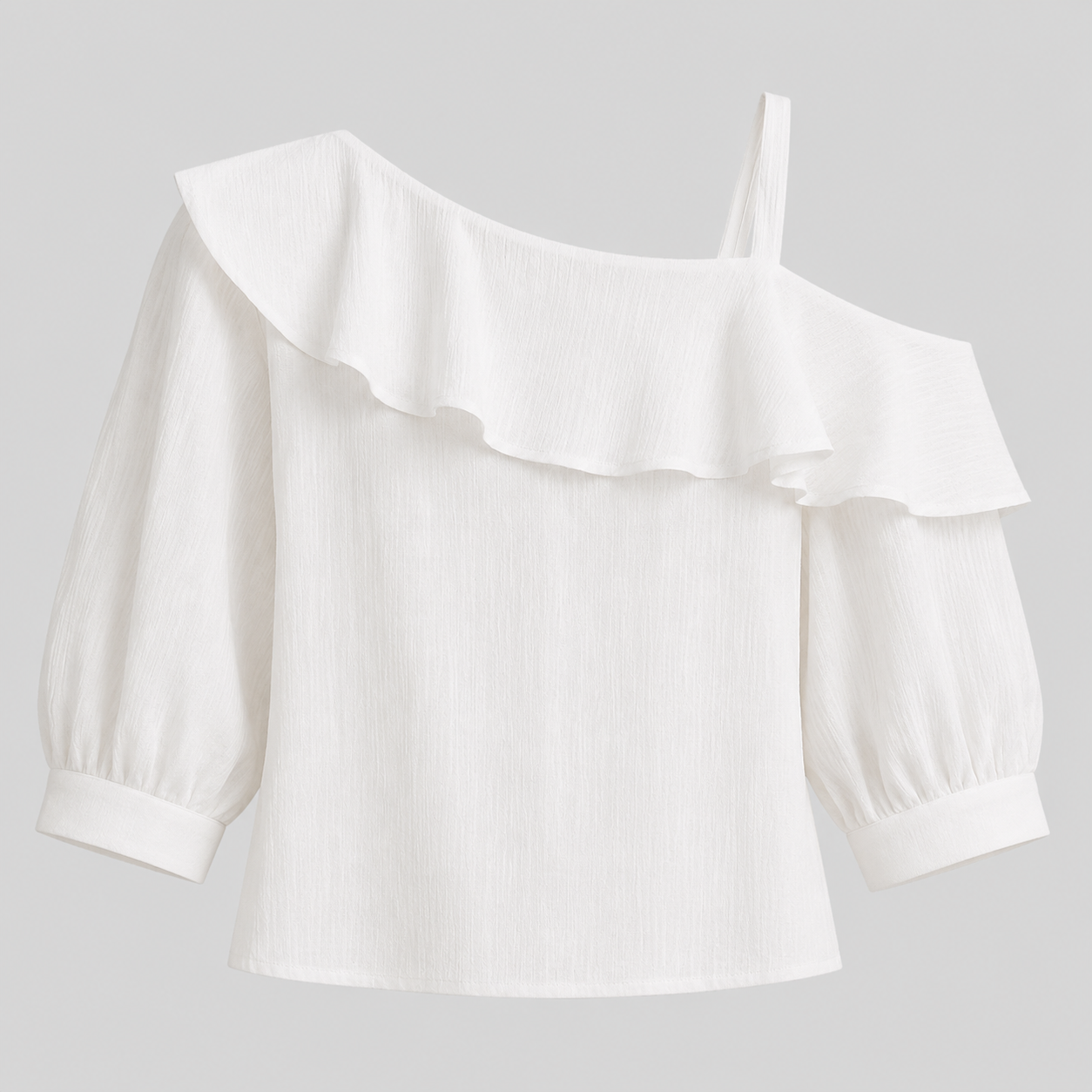 White cold-shoulder blouse with a wide ruffled neckline, long puff sleeves, and a thin shoulder strap, shown on a light gray background.