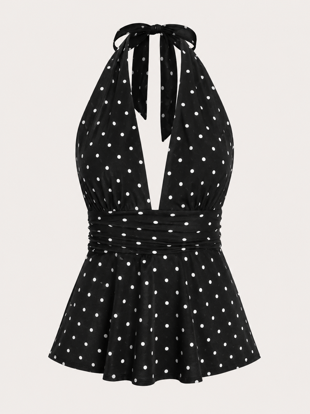 A black halter-neck dress with a white polka dot pattern, featuring a tie-neck design and a flared skirt, shown against a light beige background.